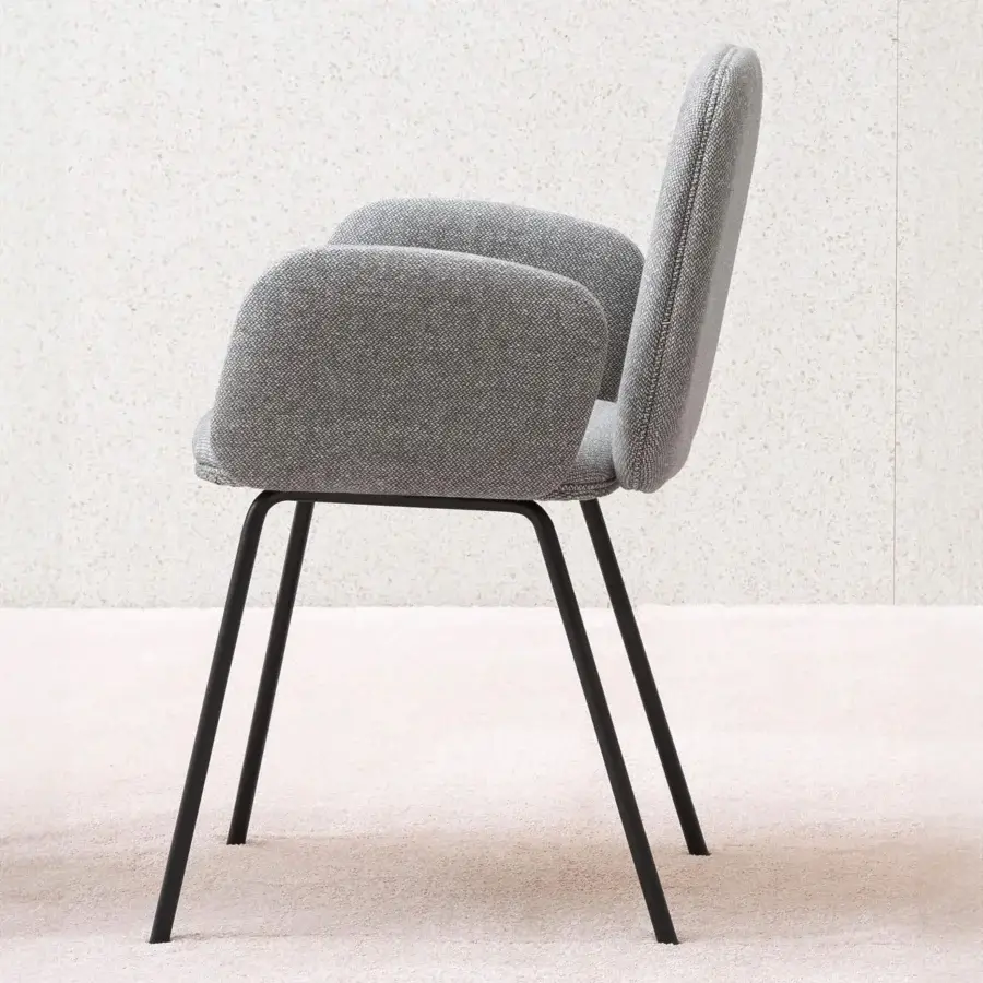 Elegant Miniforms Leda chair with soft silhouette upholstered in textured gray textile and slender dark metal legs