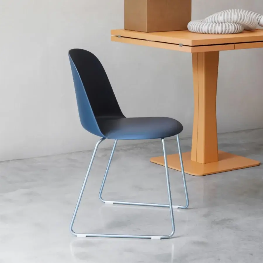 Superior Miniforms Mariolina sled chair in blue-gray gradient polypropylene with matte finish and light blue base