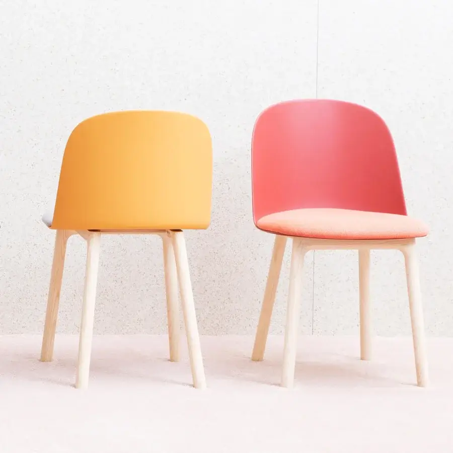 Superior Miniforms Mariolina Wood chair with coral polypropylene and light-toned wooden legs crafted in Italy