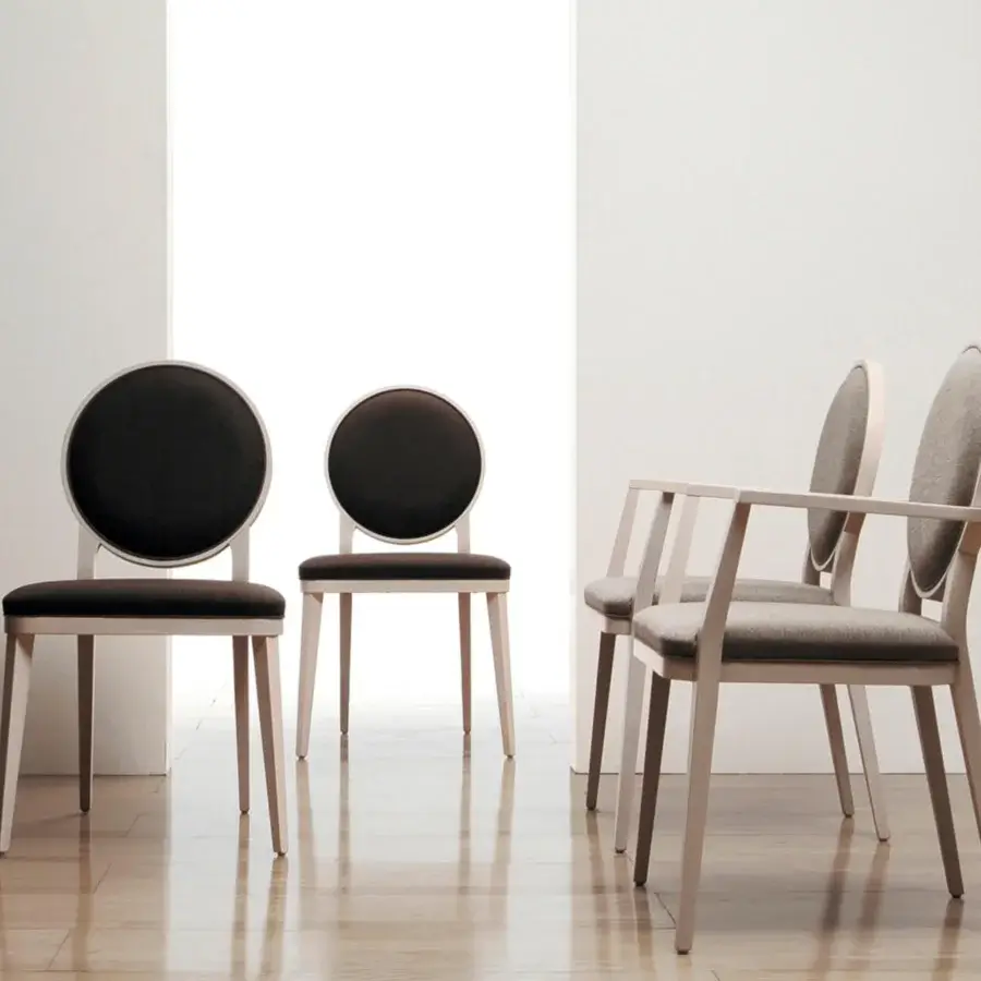 Superior Bross Plaza chair crafted in Italy with a grey textile upholstery and light-colored matte wood frame