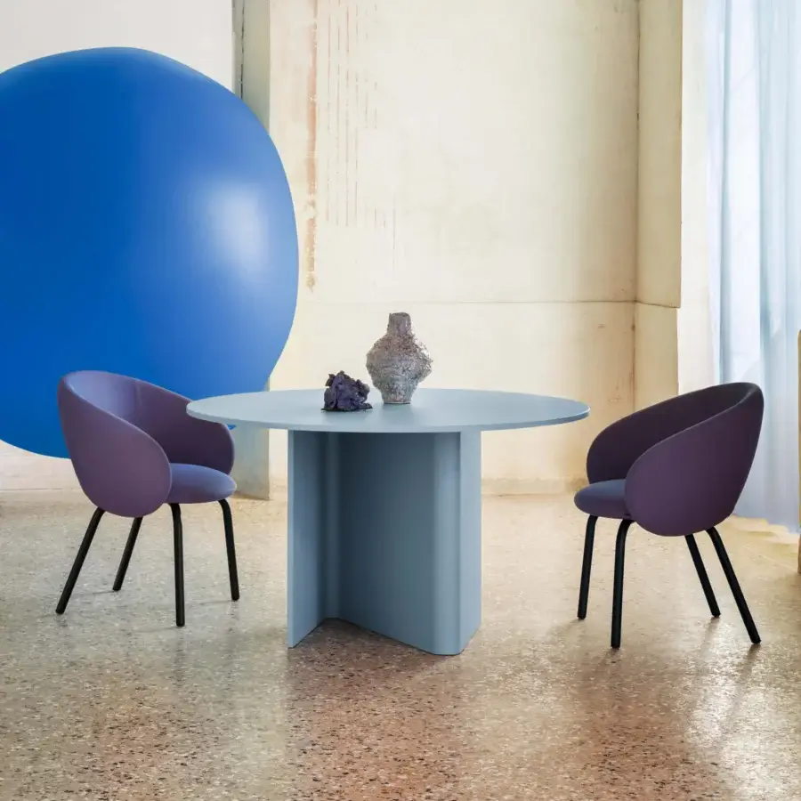 Distinctive Miniforms Nebula Tube chair upholstered in muted purple fully recyclable polyurethane with sleek black metal legs