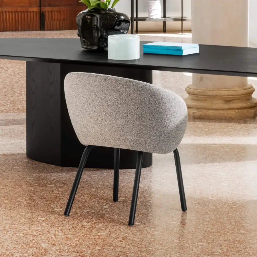 Distinguished Miniforms Nebula Tube chair upholstered in light grey textile with slender black powder-coated metal legs crafted in Italy