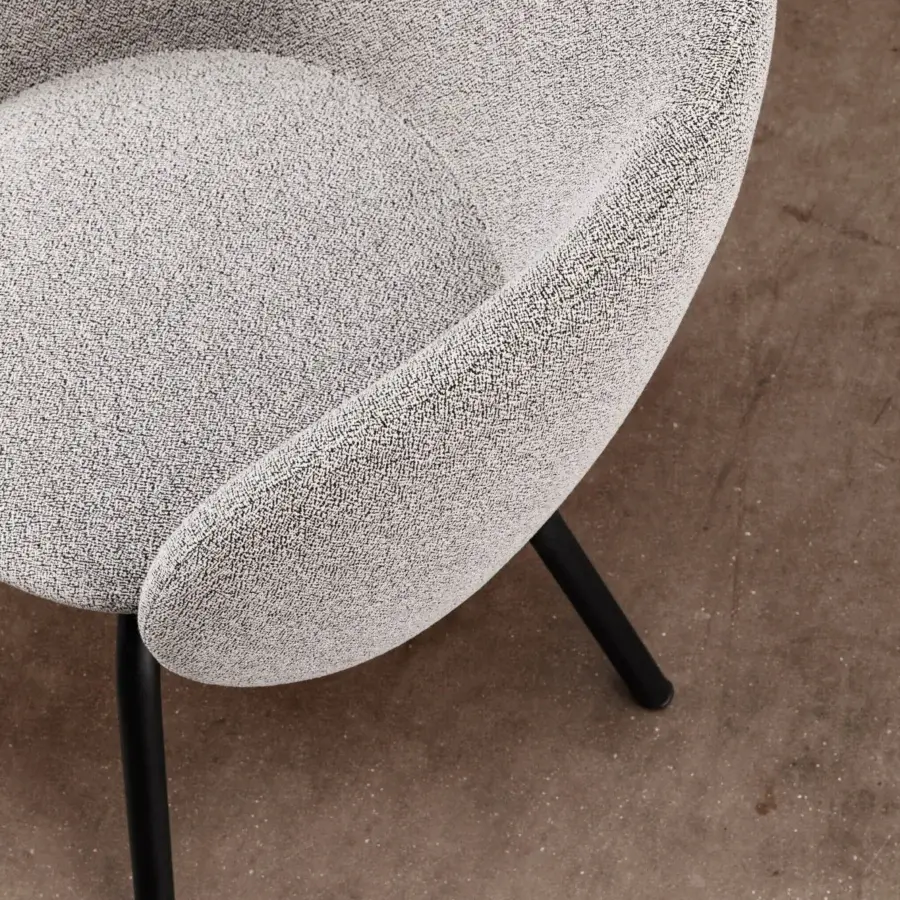 Distinguished Miniforms Nebula Tube chair upholstered in light gray textured textile with slender matte black metal legs crafted from recyclable polyurethane