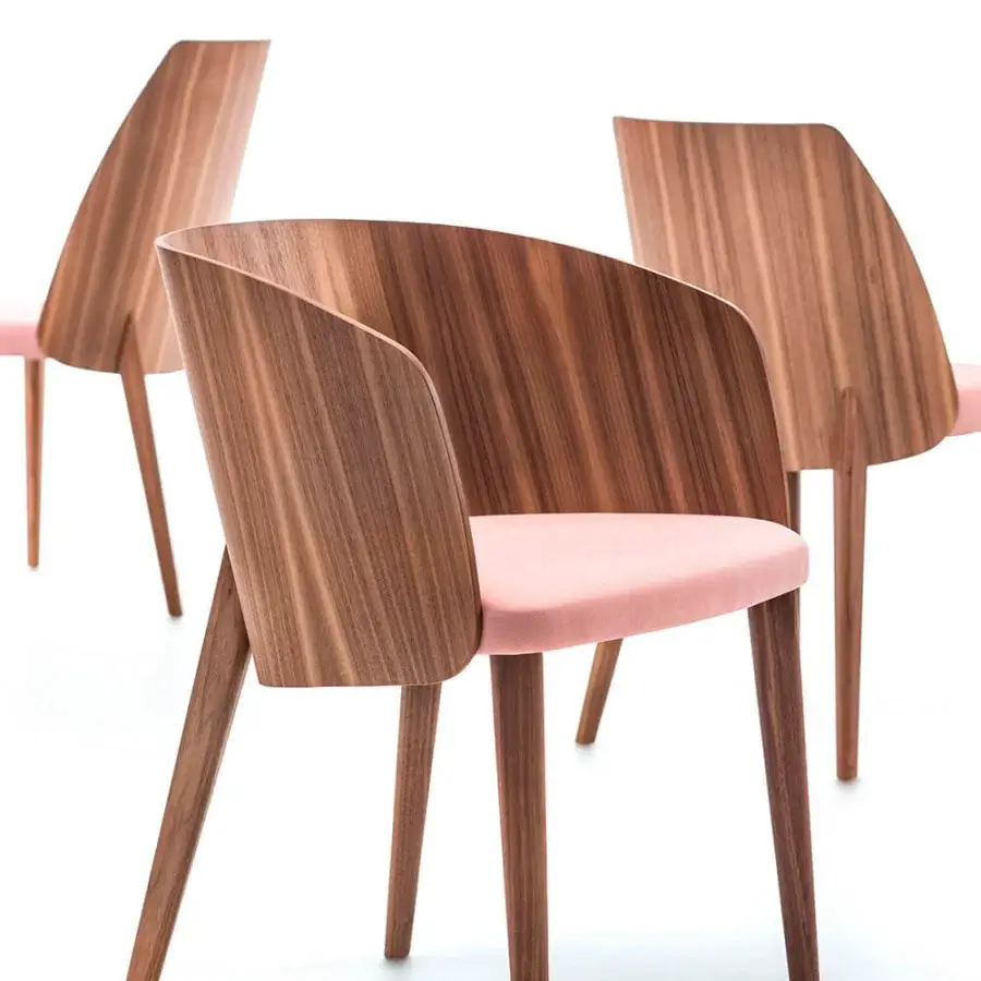 Distinguished Bross Shell armchair with curved wood frame, smooth finish and plush pink upholstery for residential spaces