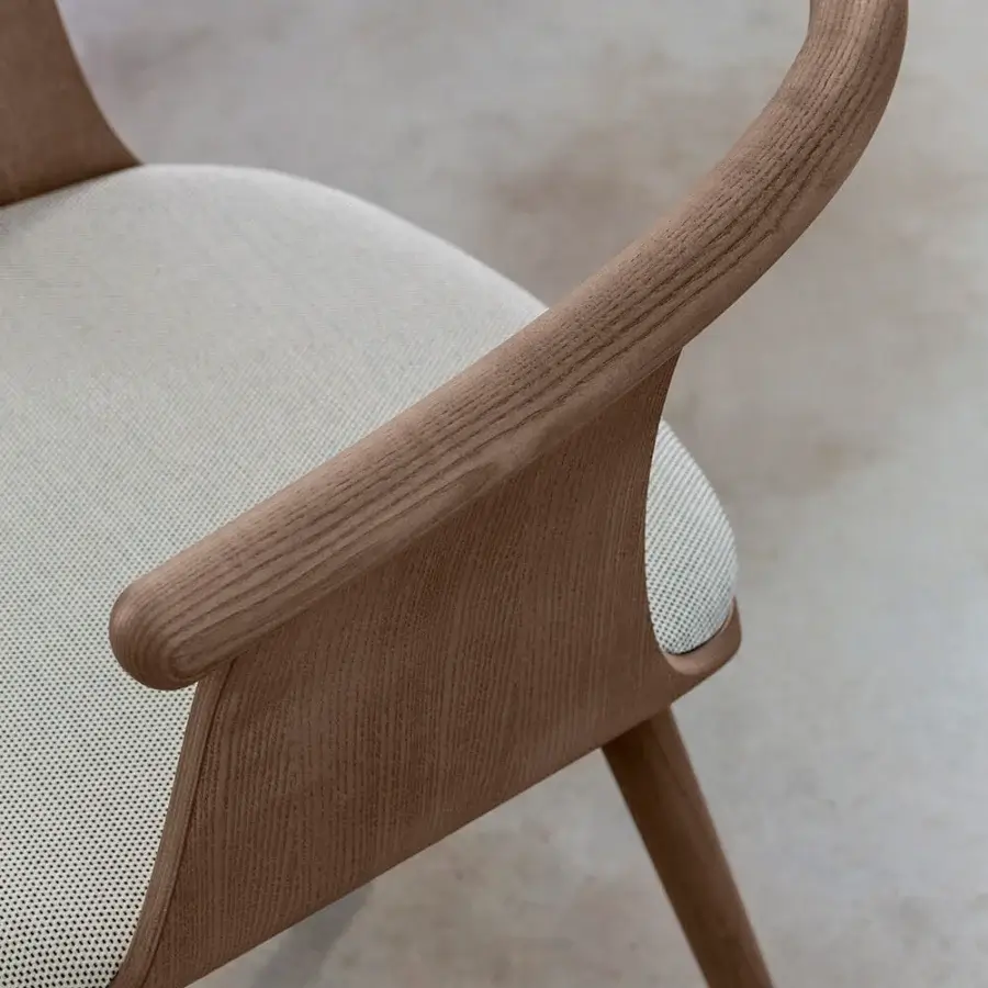 Distinguished Bross Yuumi armchair with ashwood structure and cream premium fabric showcasing a warm brown finish