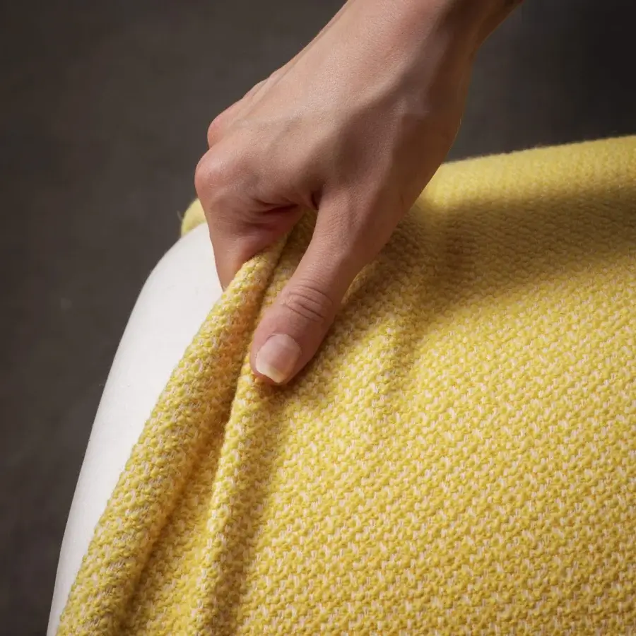 Distinguished Miniforms Nebula Monaca chair with dense enveloping design in textured yellow textile and bright white cushioning