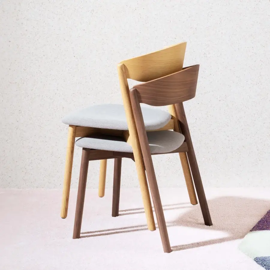 Distinguished Miniforms Tube chair with light gray upholstery and curved light-toned wood legs crafted in Italy