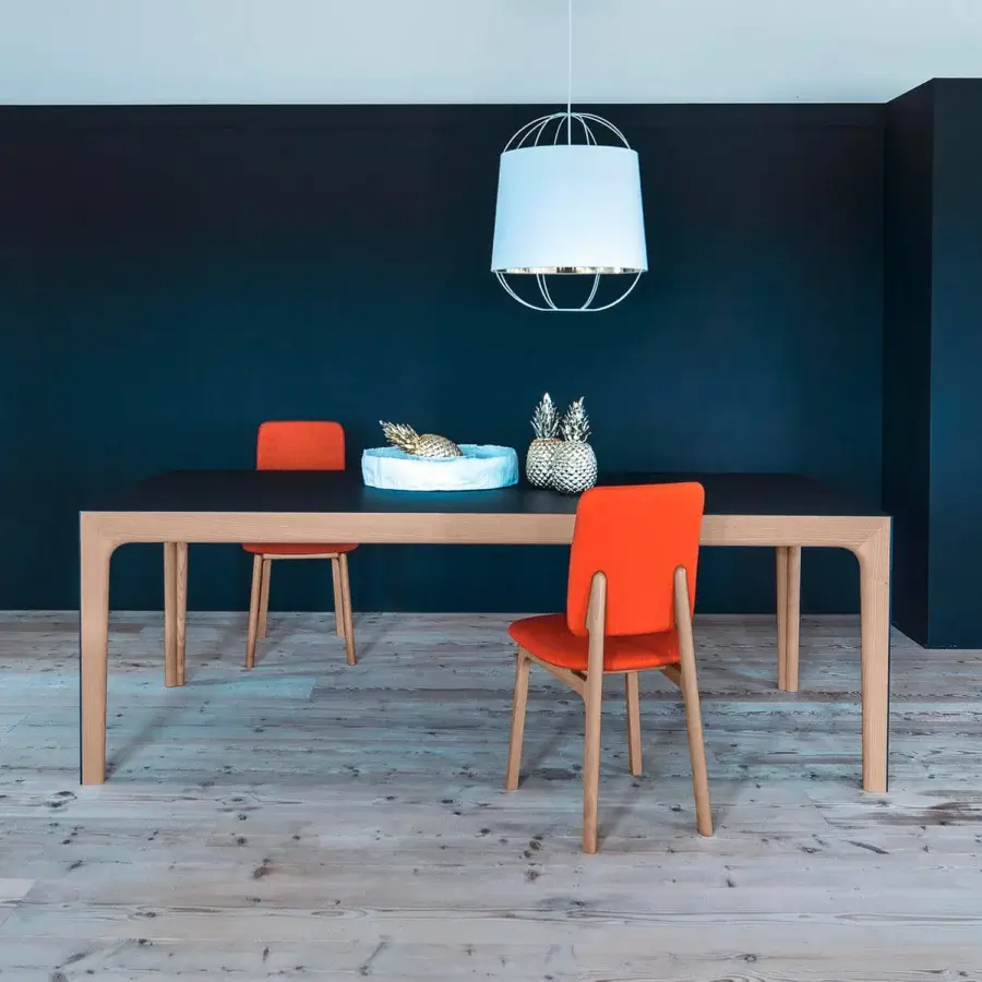 Exceptional Bross Amalong table with a dark tabletop and light-toned solid ash frame built with a minimalist design