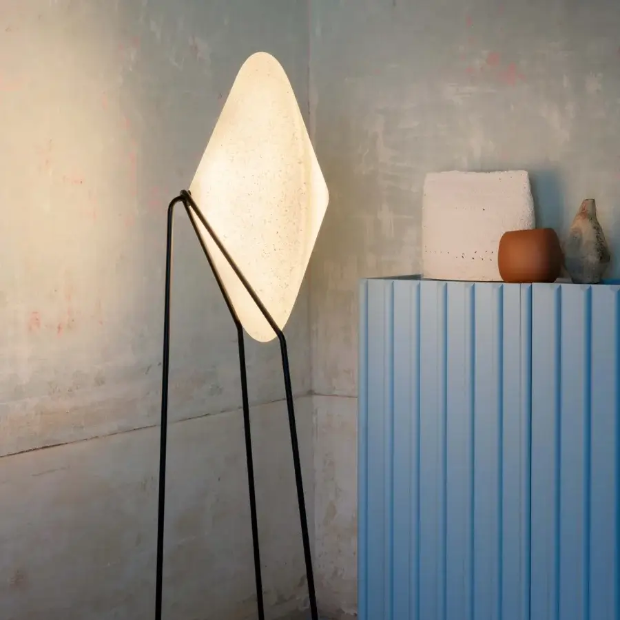 Distinguished Miniforms Rificolona floor lamp with a diamond shade crafted in recycled polyethylene and sleek black metal frame