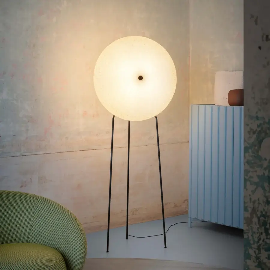 Superior Miniforms Rificolona floor lamp with a round shade crafted in recycled polyethylene and slender dark metal tripod legs