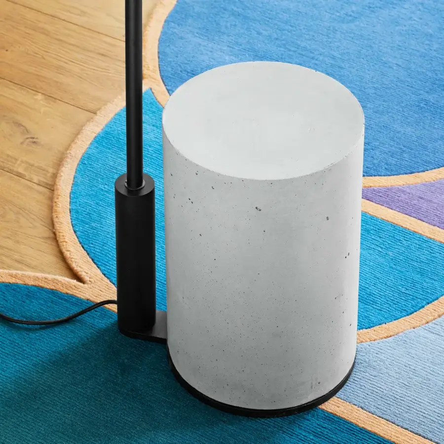 Harmonious Miniforms Ozz floor lamp with matte black metal support and light gray concrete base crafted in Italy