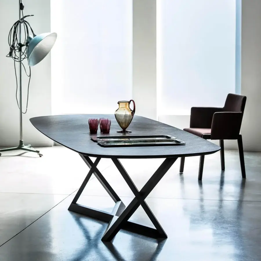 Superior Bross Bridget table with solid oak frame and oval dark matte wood top crafted in Italy