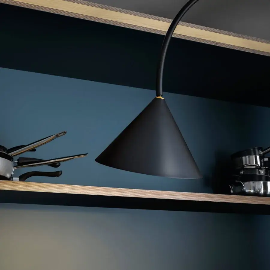 Elegant Miniforms Ozz wall lamp with a sleek curved silhouette crafted in matte black metal for focused illumination