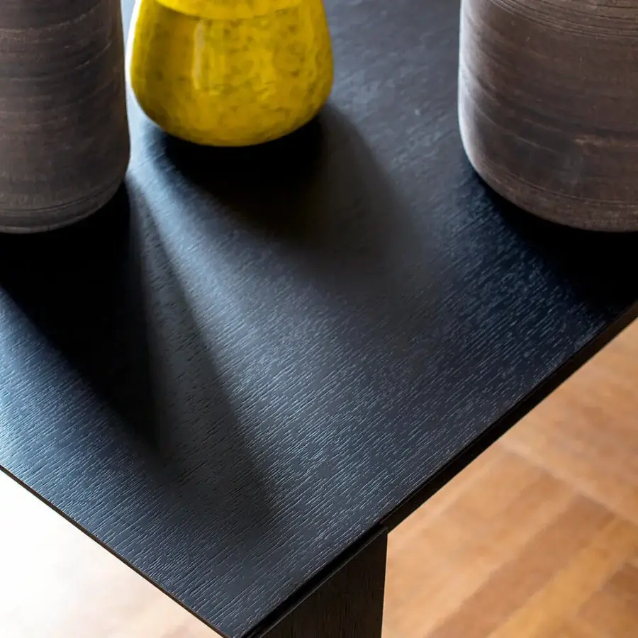 Distinguished Bross Joy extendable table crafted in oakwood with dark matte finish and geometric silhouette