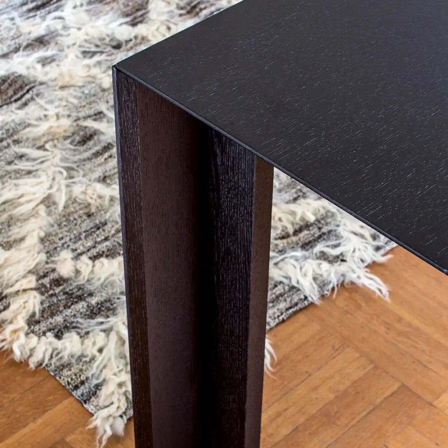 Exceptional Bross Joy extendable table in oakwood with dark matte finish presents a modern aesthetic
