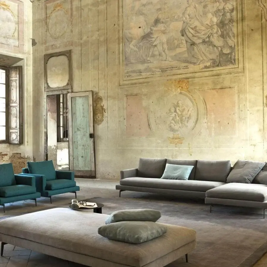 Superior Verzelloni Larsen lounge chair with matte teal-blue textile upholstery and dark metal legs crafted in solid wood and plywood