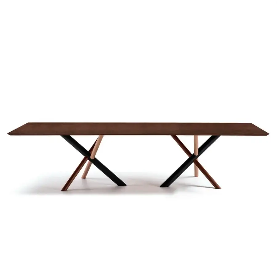 Distinguished Bross W table crafted with a wood-like top and American walnut crossed legs in RAL 7016 metal