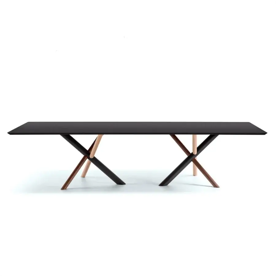 Superior Bross W table crafted in American walnut with a minimalist design and intersecting legs
