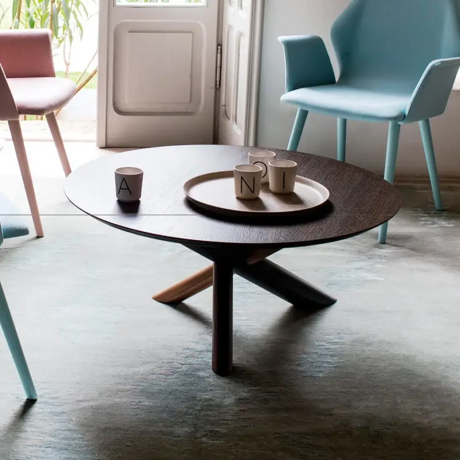 Exceptional Bross W table crafted in dark brown wood with American walnut supports and a RAL 7016 metal foundation exhibiting visible wood grain