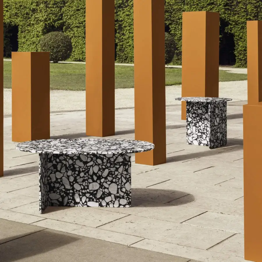 Elegant Miniforms Chap coffee table crafted in Palladio Moro marble with contrasting black and white patterned base