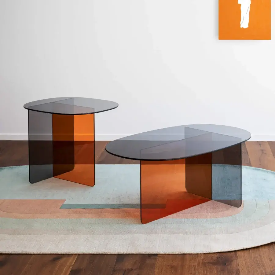 Distinctive Miniforms Chap coffee table with angular silhouette and transparent orange-brown smoky dark gray glass construction