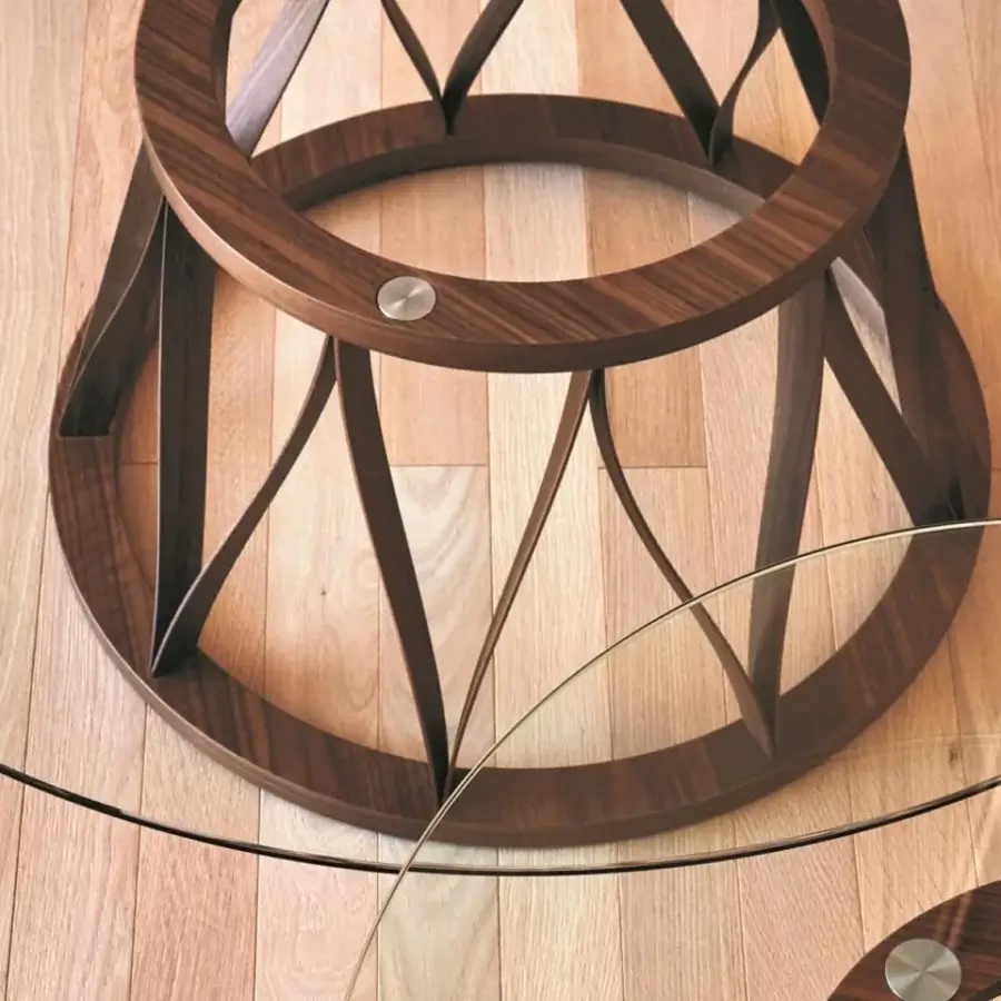 Exceptional Miniforms Acco coffee table with a clear glass top and warm brown wooden base crafted with interconnected arches