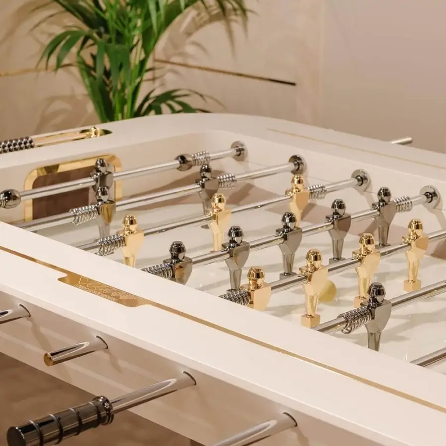 Exclusive Vismara Stadium foosball built with glossy white lacquered wood, extra light tempered glass, and 24kt gold plated players