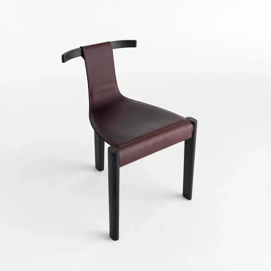 Captivating Casamania Pablita chair with ashwood frame and supple brown leather seat built with stainless steel connections