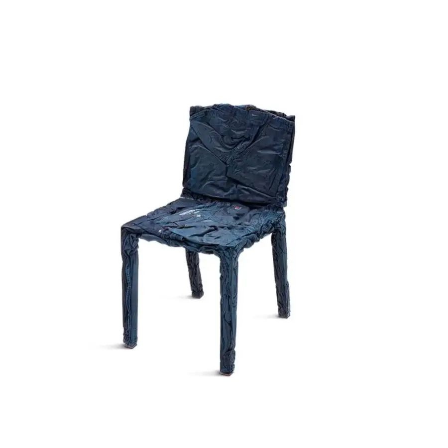 Superior Casamania Rememberme chair built in dark blue denim with a matte finish showcasing visible seams and pockets