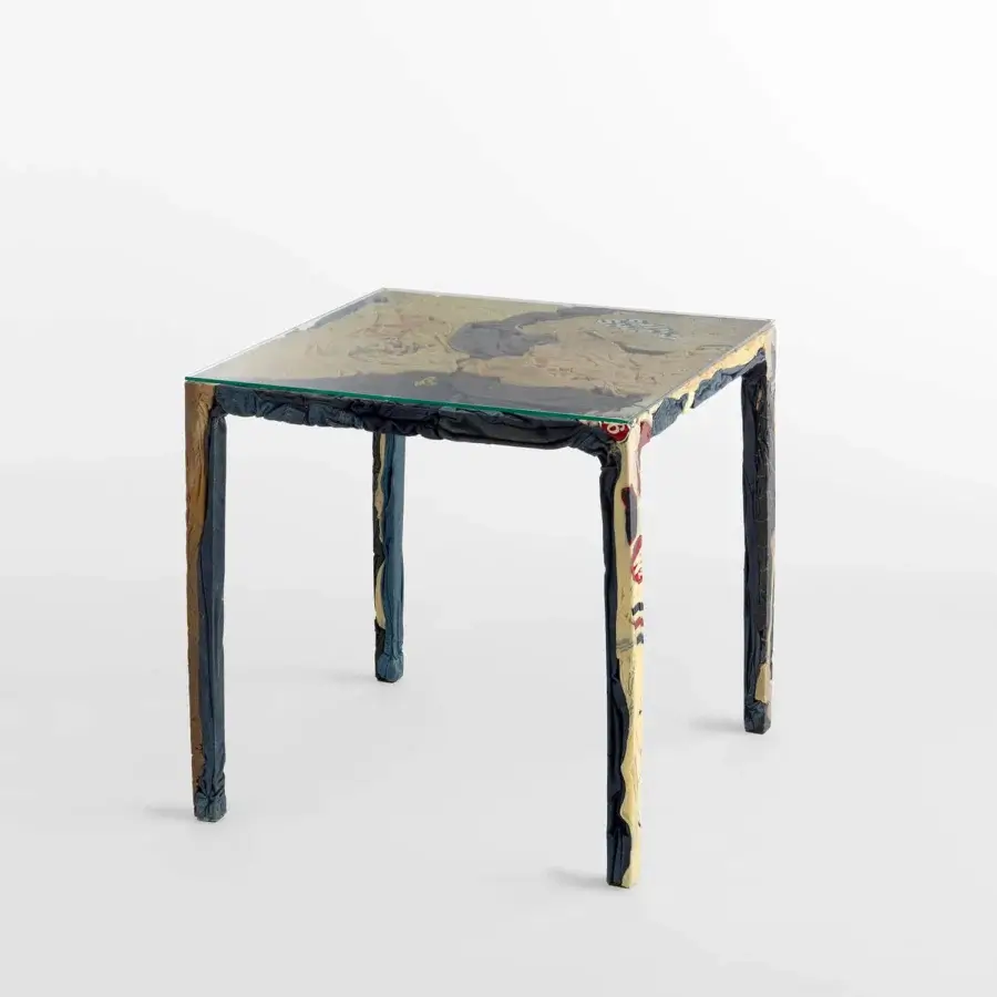 Distinctive Casamania Rememberme bistrot table crafted in Italy with a square glass top and textured recycled jeans finish