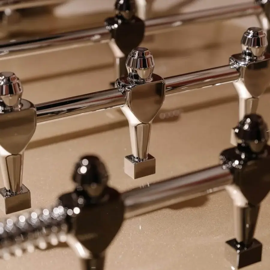 Distinguished Vismara Stadium foosball built with lacquered wood, tempered glass, and gold plated players in a glossy finish