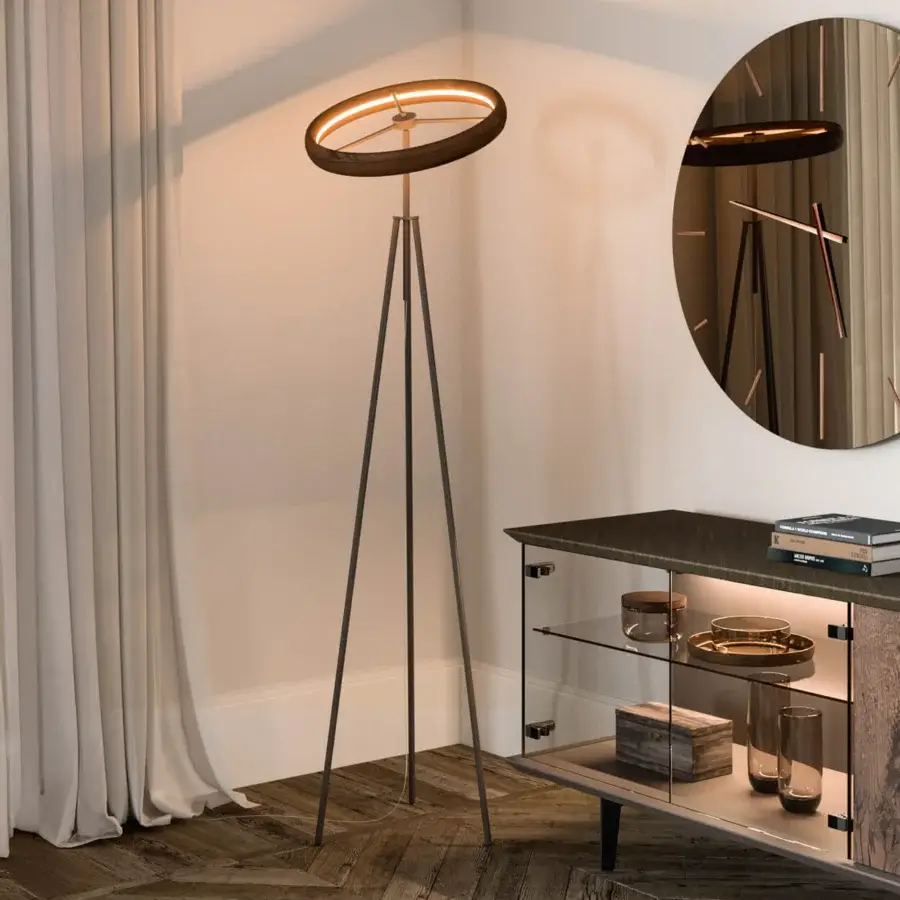 Superior Ozzio Italia Discovery floor lamp with dark metal tripod base and circular light element providing homogeneous illumination