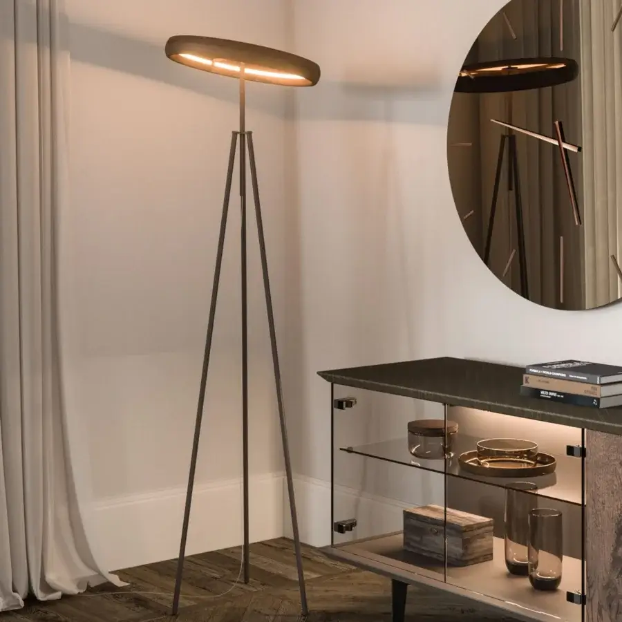 Elegant Ozzio Italia Discovery floor lamp with a disc shade and dark-toned metal stem built with a tripod base