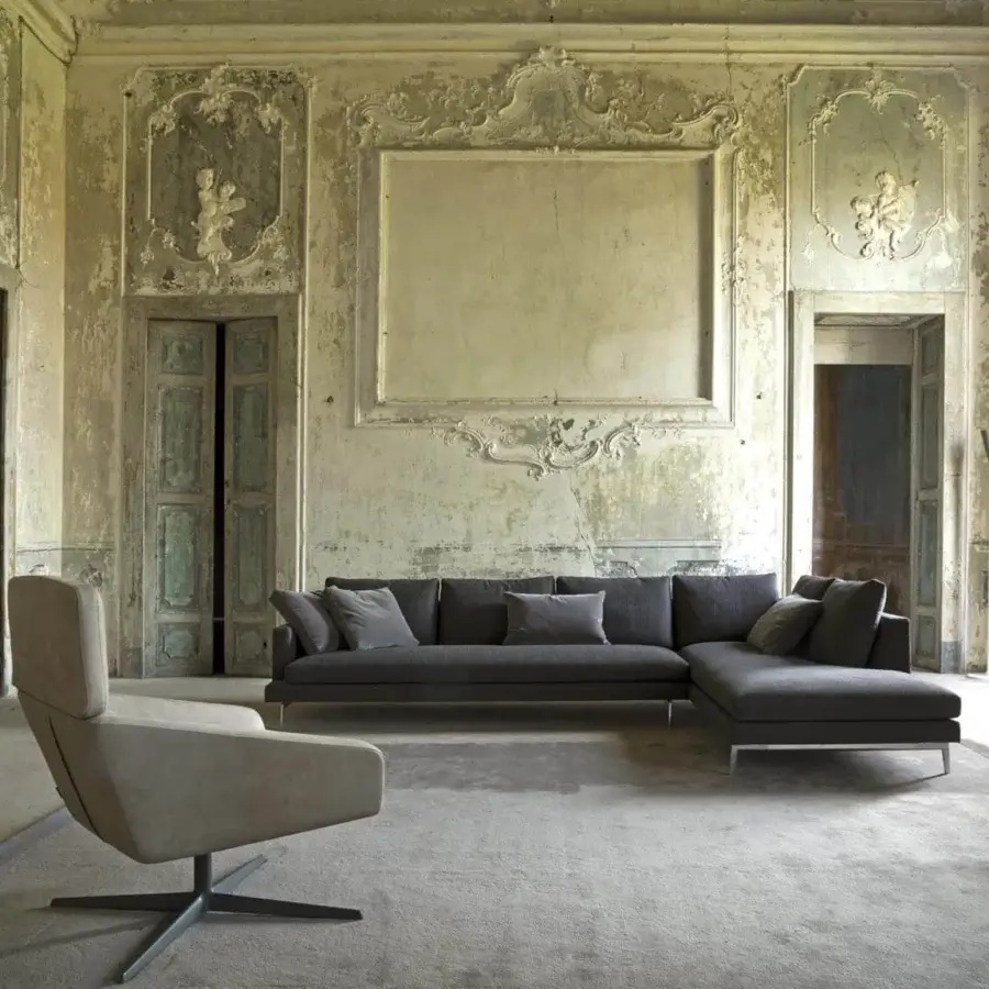 Superior Verzelloni Larsen sectional sofa upholstered in dark gray textile with polished aluminum cast legs