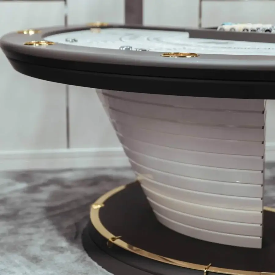 Captivating Vismara Napoleon blackjack table with curved form, light microfiber top and golden accents with lacquered finishes and steel profiles