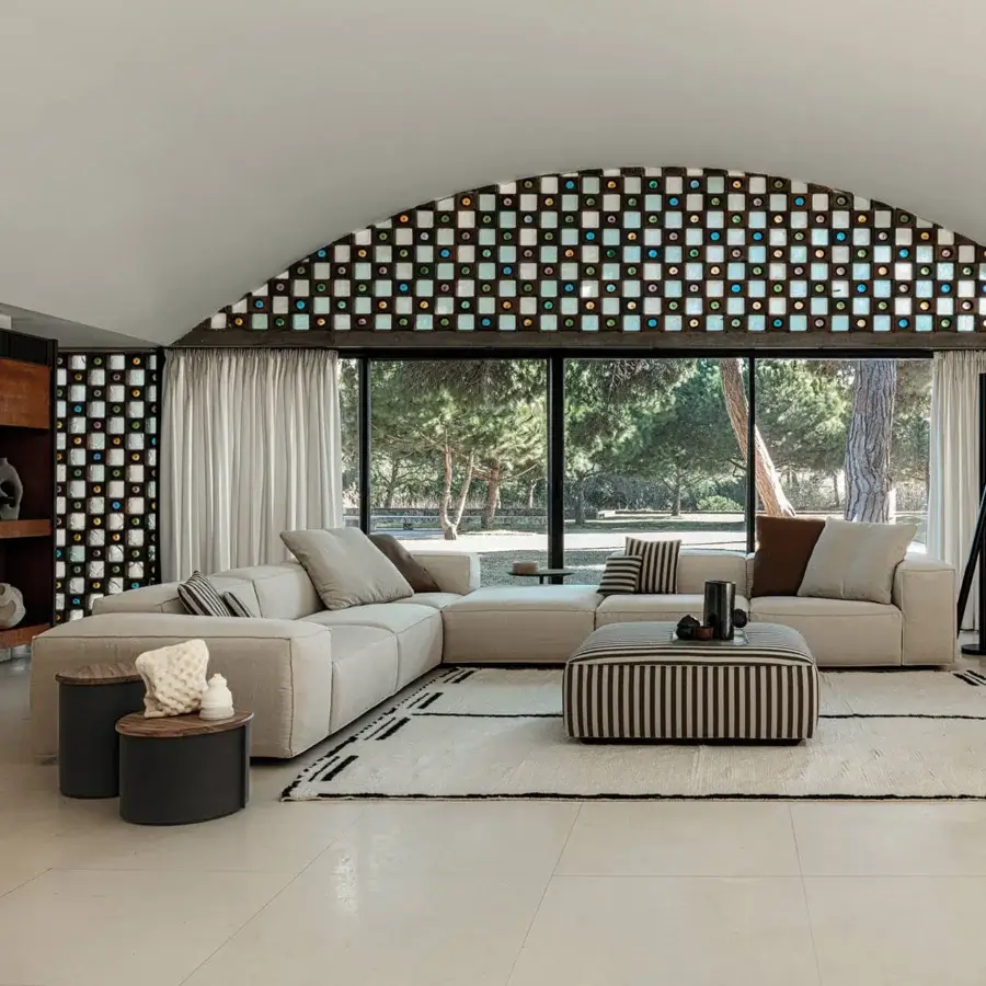 Harmonious Cierre1972 Season sectional with light beige textile and geometric silhouette built with flat-fell pinched seams