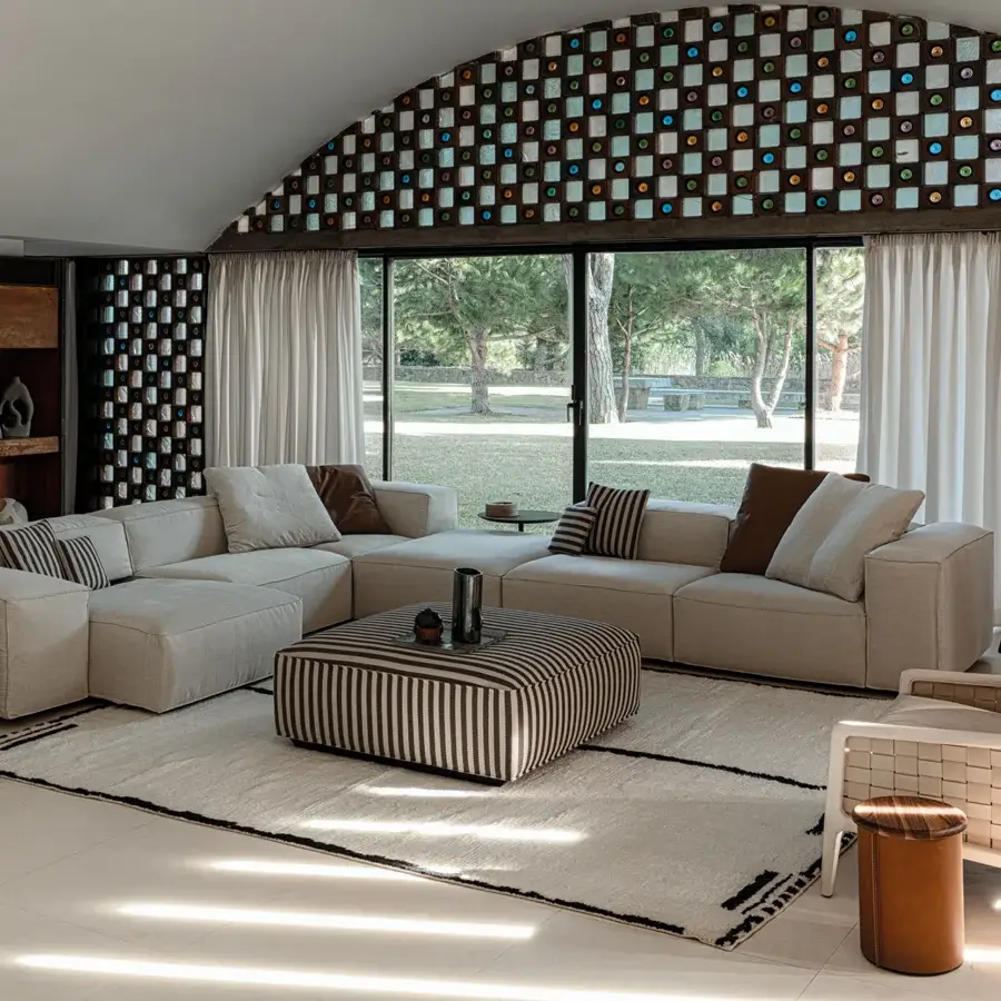Harmonious Cierre1972 Season sectional with light beige textile upholstery and matte finish, presenting refined geometric shapes