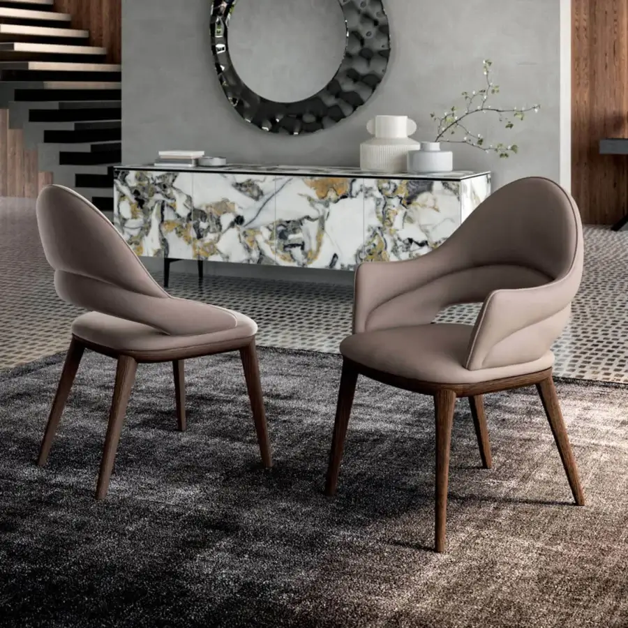 Elegant Ozzio Italia Baia chair with sinuous lines in light taupe matte synthetic material and a dark stained solid ash structure