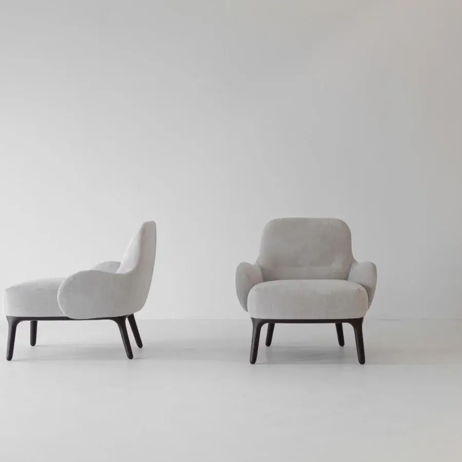 Distinguished Cierre1972 Woody lounge chair in light gray woven textile with dark-toned wood legs and matte finish