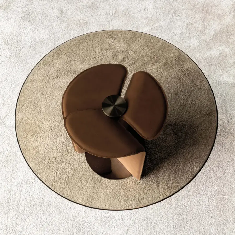 Avant-garde Cierre1972 Helix coffee table with a warm brown helix base and clear glass top