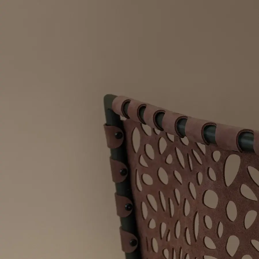 Distinguished Cierre1972 Regis swivel lounge chair in dark metal with perforated brown leather-like backrest and included siliconized microfiber lumbar cushion
