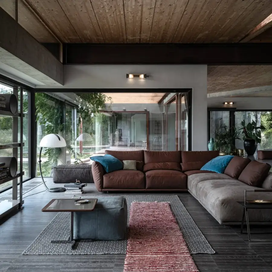 Superior Cierre1972 Clift sectional crafted in Italy with a matte textile and contrasting sections for harmonious comfort