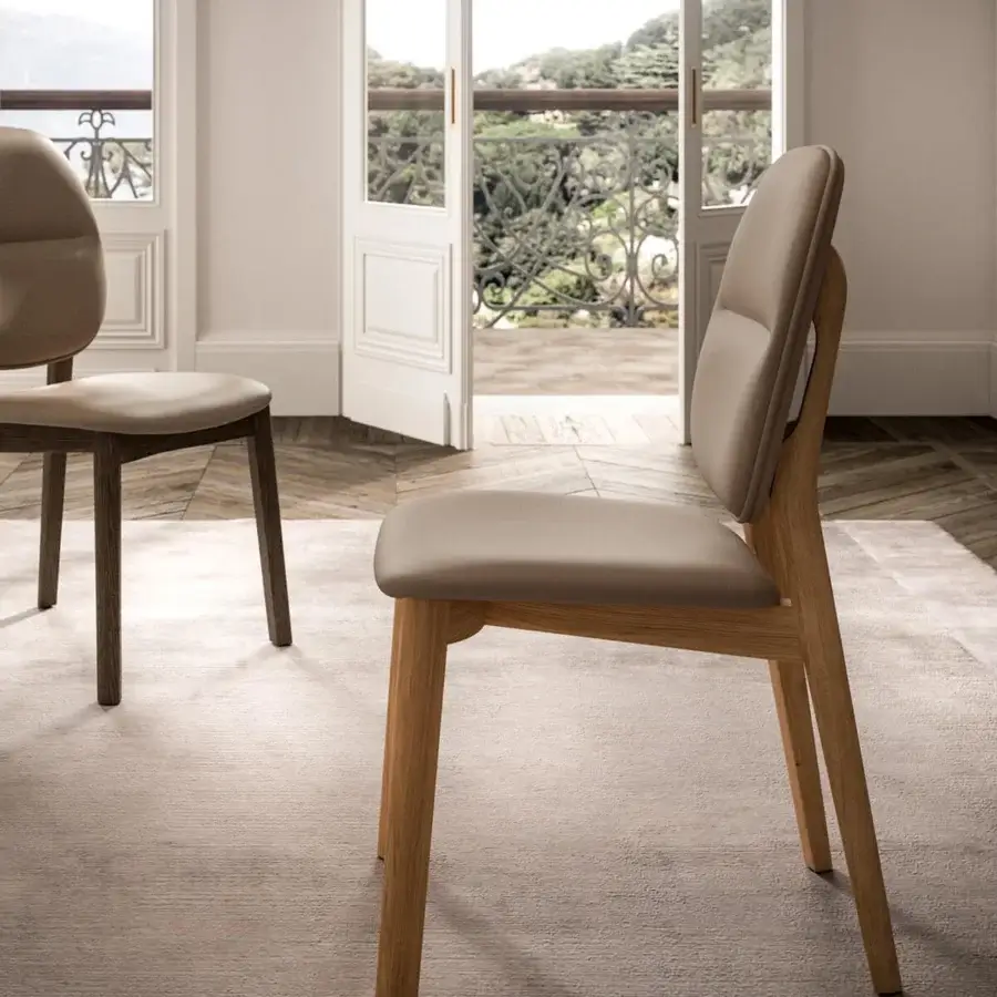 Exceptional Ozzio Italia Giotto chair with light-toned solid ash wood and smooth light brown material upholstery crafted for comfort