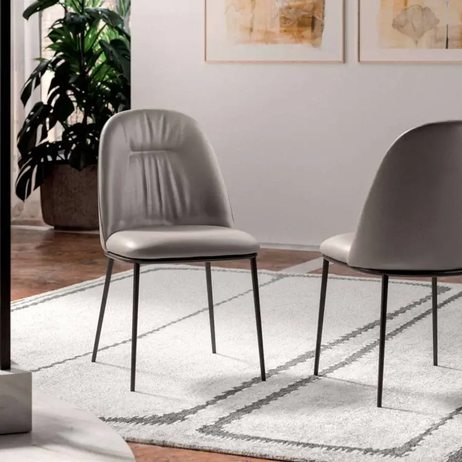 Superior Ozzio Italia Juliette chair with gray synthetic leather upholstery and softly curved seat built with tapered metal legs
