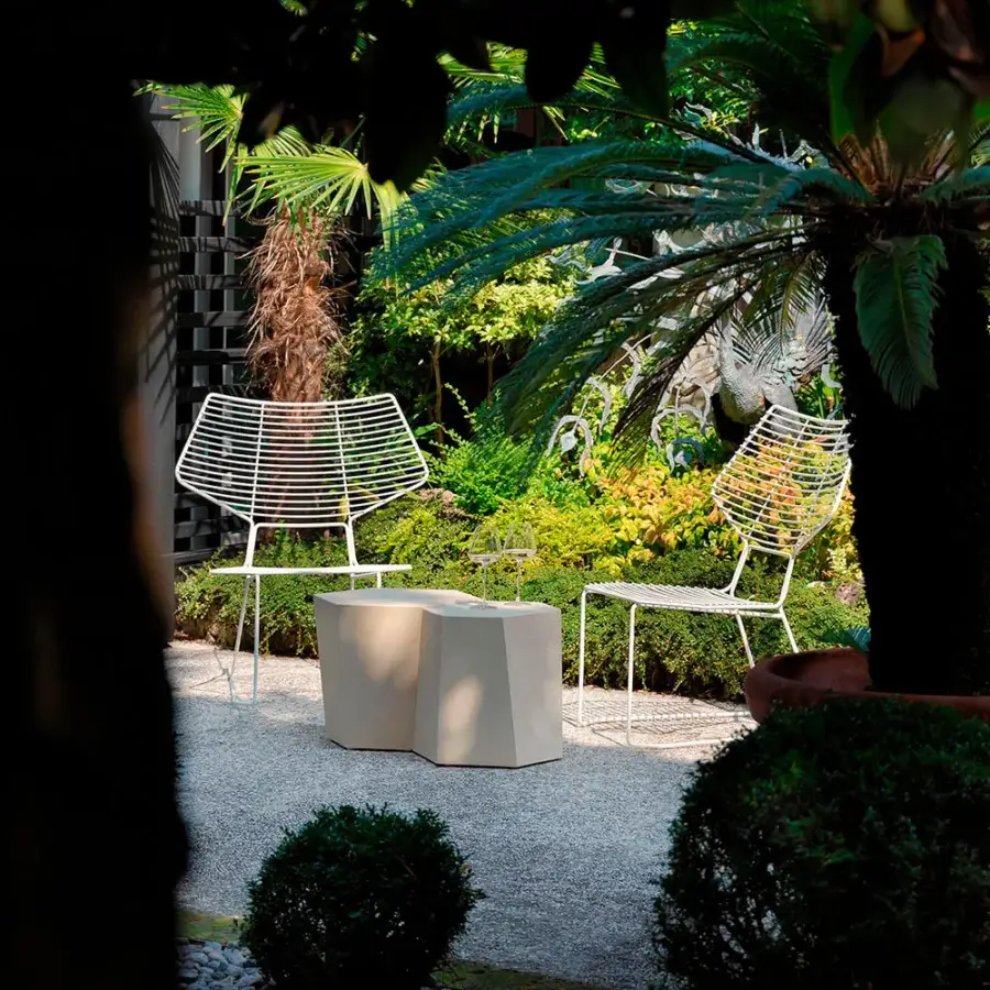 Distinguished Casamania Alieno lounge chair with geometric silhouette and matte white painted metal construction