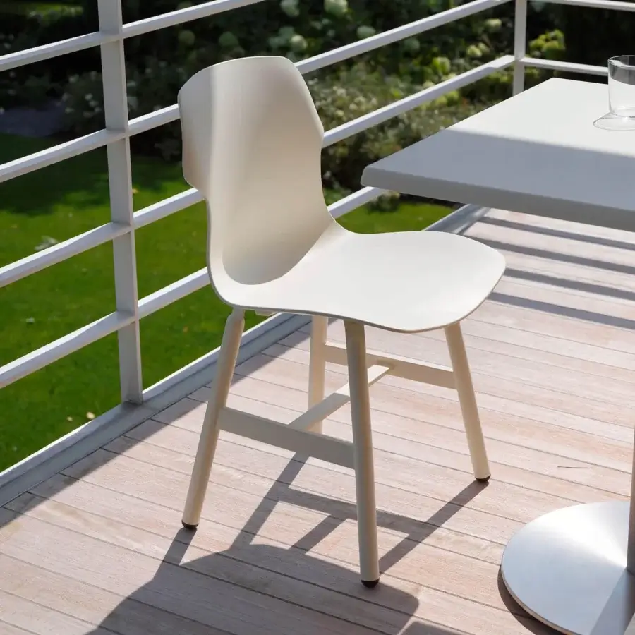 Superior Casamania Stereo chair with organic silhouette and smooth light beige finish crafted in Italy
