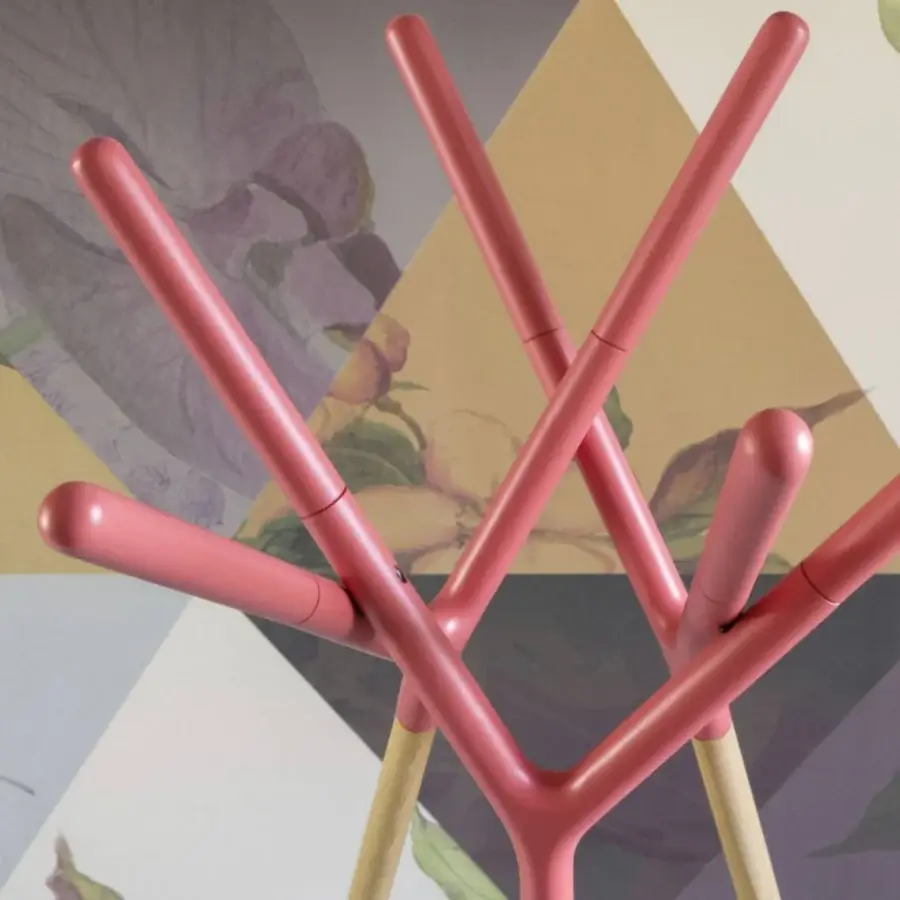Exceptional Miniforms Game of Trust coat stand with unified Y-shaped elements in coral pink synthetic material and smooth finish