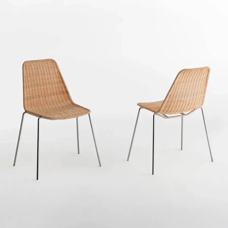 Exceptional Casamania Sin chair with hand-woven natural wicker structure and sleek chromed metal frame in a light beige matte finish