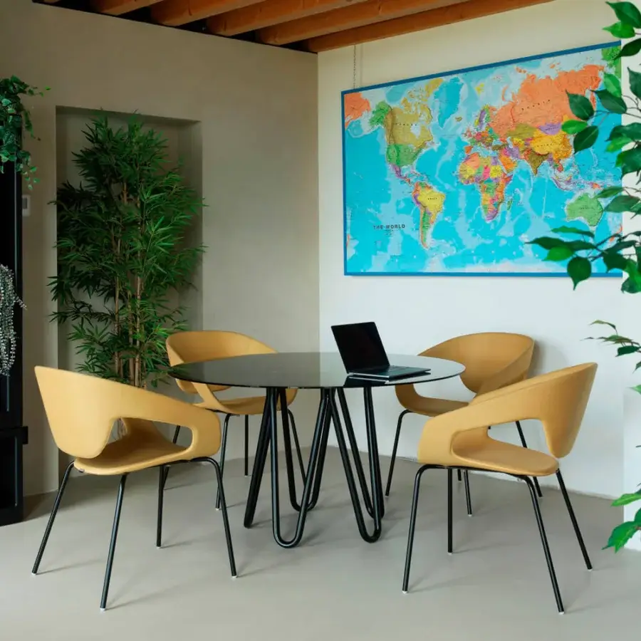 Distinguished Casamania Meduse table with a smoked glass top and matte black painted metal base exhibiting supple design