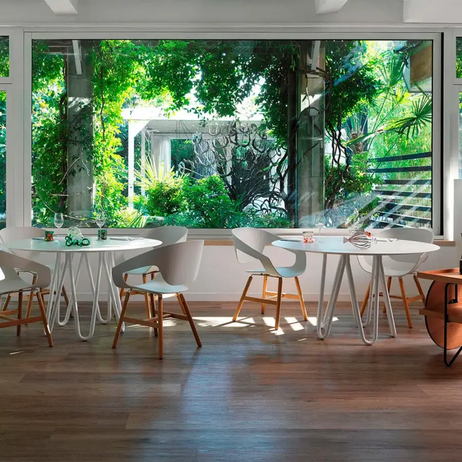 Captivating Casamania Meduse table with smooth matte white tabletop and curved painted metal legs